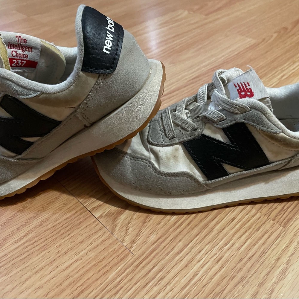 New Balance White and Black Sneakers